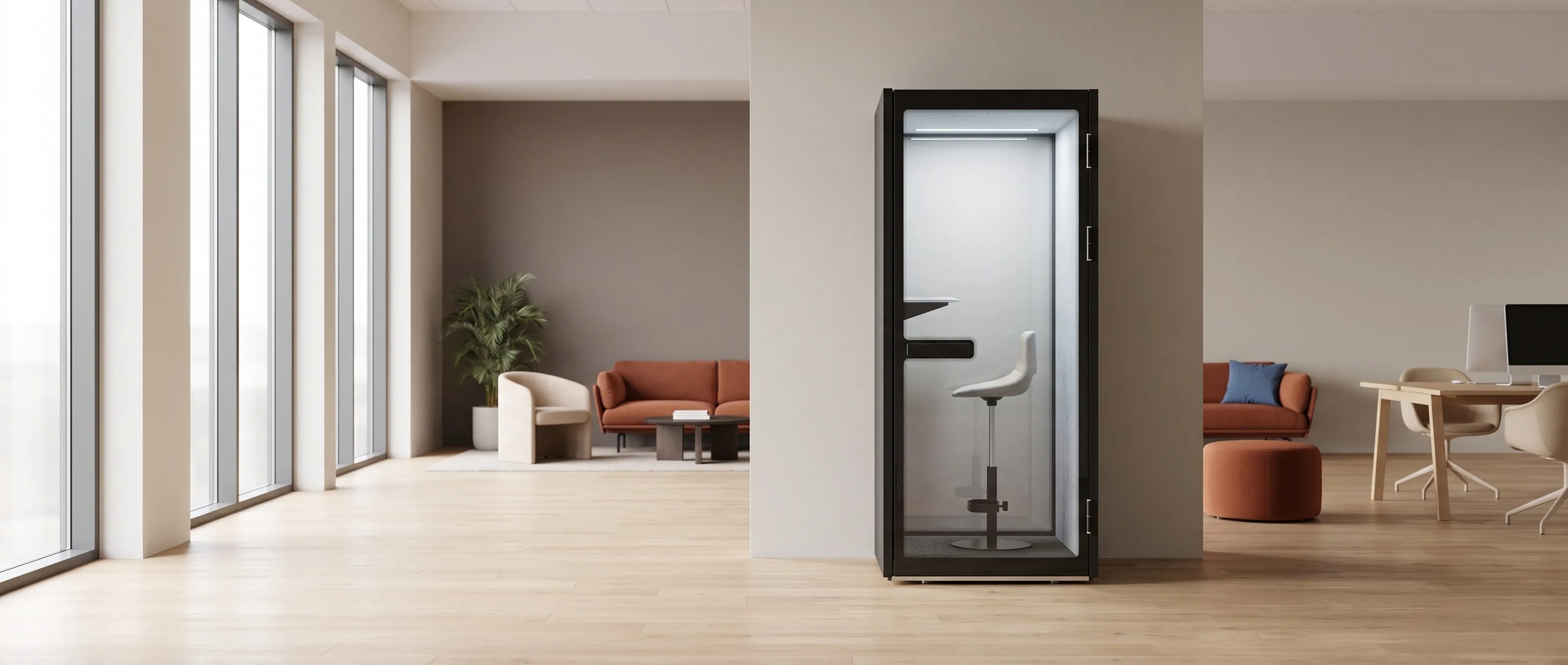 S-Pod office phone booth set into the corner of a warm open-plan office