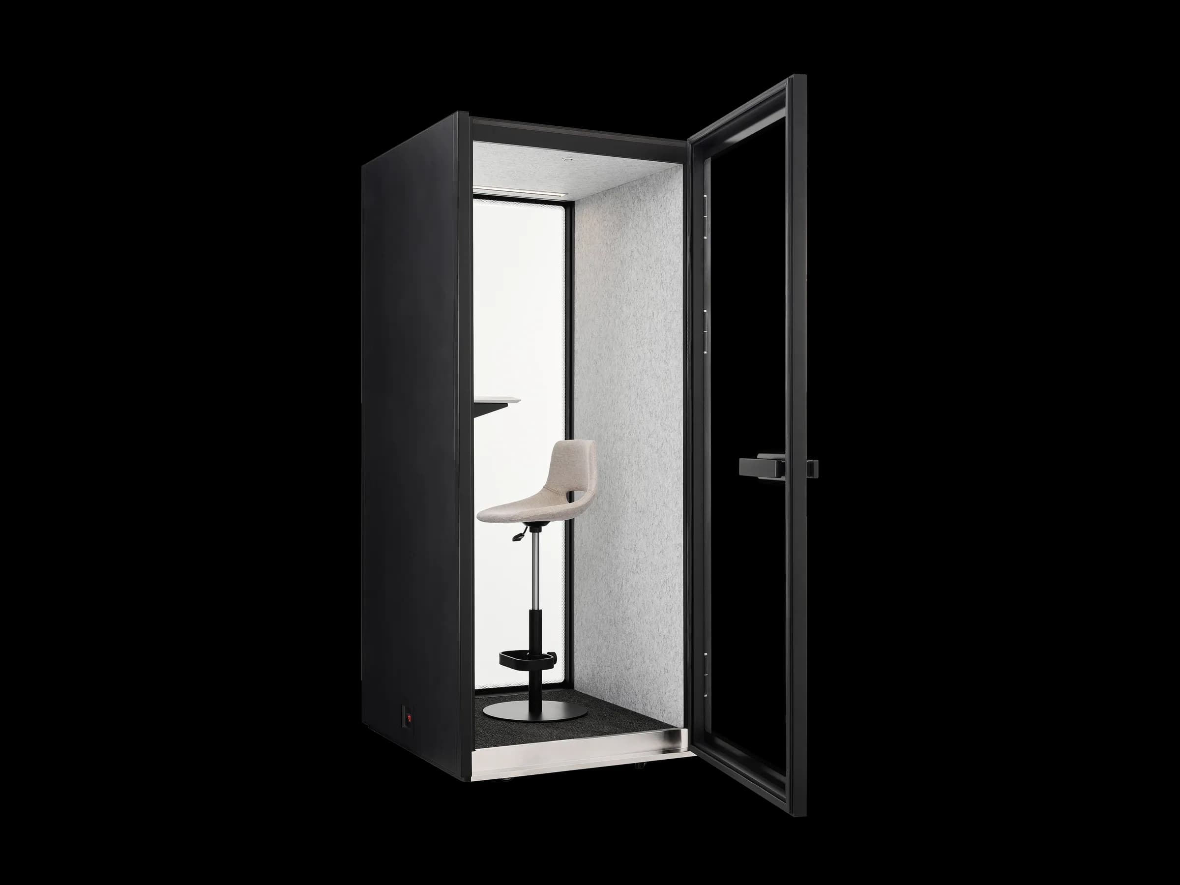 An S-Pod with its door open, showing the sit-stand desk and height-adjustable stool inside